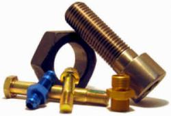 Arrangement of different screws and bolts used in military and aerospace applications.