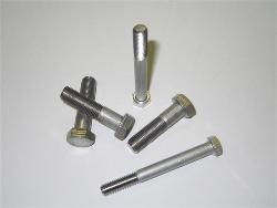 Mil spec hex cap stainless steel screws of various sizes.